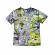 An artisanal ice-dyed t-shirt, its surface a canvas of swirling blues, purples, and chartreuse resembling geode formations, with the text 'dazed' in a stylized, icy lettering at the center.