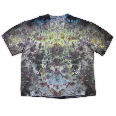 An eye-catching ice-dyed t-shirt showcasing a vibrant explosion of purples, pinks, and grays with a smoky effect around the 'dazed' text featured in the center.