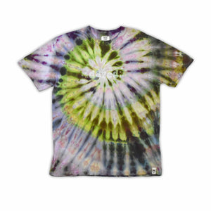 This t-shirt displays an intricate ice-dye effect that creates a starburst pattern with a mix of earthy and vibrant colors, highlighted by 'dazed' text in the middle in a style reminiscent of melting ice.