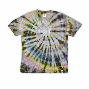 This t-shirt displays an intricate ice-dye effect that creates a starburst pattern with a mix of earthy and vibrant colors, highlighted by 'dazed' text in the middle in a style reminiscent of melting ice.