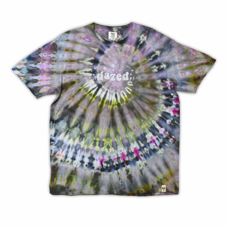 This t-shirt displays an intricate ice-dye effect that creates a starburst pattern with a mix of earthy and vibrant colors, highlighted by 'dazed' text in the middle in a style reminiscent of melting ice.