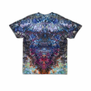 An ice-dyed t-shirt with a mesmerizing array of blues, purples, and subtle greens, reminiscent of a frozen geode, with 'dazed' in an icy font across the chest.