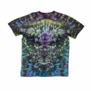 An ice-dyed t-shirt with a mesmerizing array of blues, purples, and subtle greens, reminiscent of a frozen geode, with 'dazed' in an icy font across the chest.