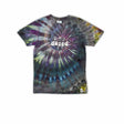 This t-shirt displays a stunning ice-dye technique creating a crystalline effect with vibrant blues, purples, and greens emanating outwards, with 'dazed' situated in the middle in a funky font.