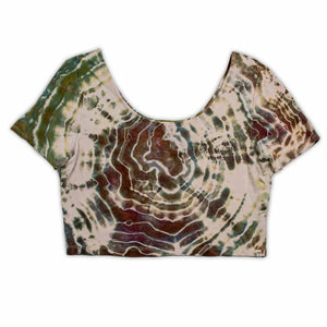 A casual, ice-dyed scoop neck top showcasing a hypnotic array of swirls and lines in colors inspired by the earth, including dark green, terracotta, and sand.