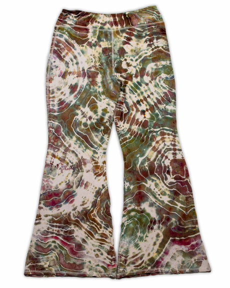 A pair of ice-dyed wide-leg pants that evoke the colors of the earth, with detailed patterns in shades of sage, wine, and sandstone.