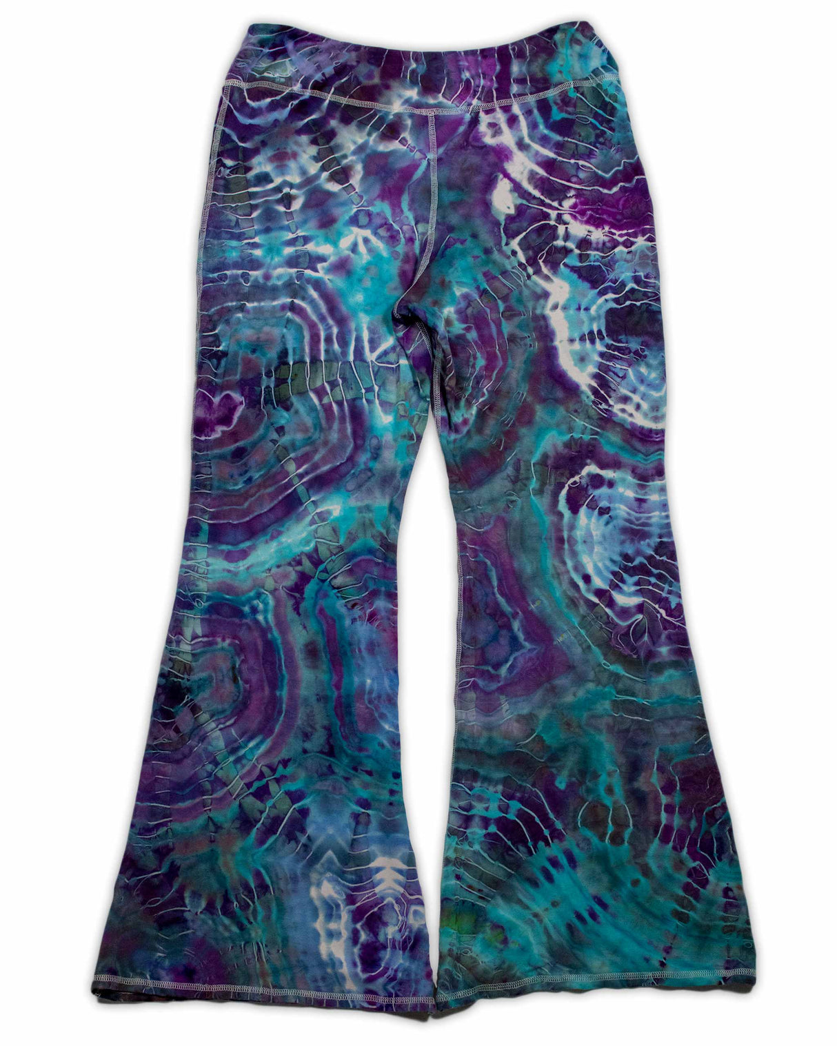 A pair of hand-dyed pants showcasing a unique ice-dye technique with organic patterns in a striking combination of sapphire, violet, and seafoam green.