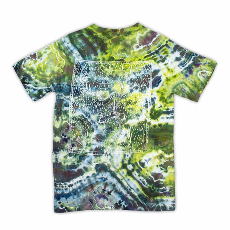 Vibrant streaks of lavender, cerulean, and jade converge in a geode-inspired ice dye pattern on this t-shirt, showcasing 'Dinkey Creek' screen printing.