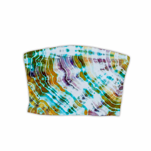 This hand-dyed bandeau top presents a mesmerizing display of cool and warm colors blending into organic shapes, akin to an aerial landscape.