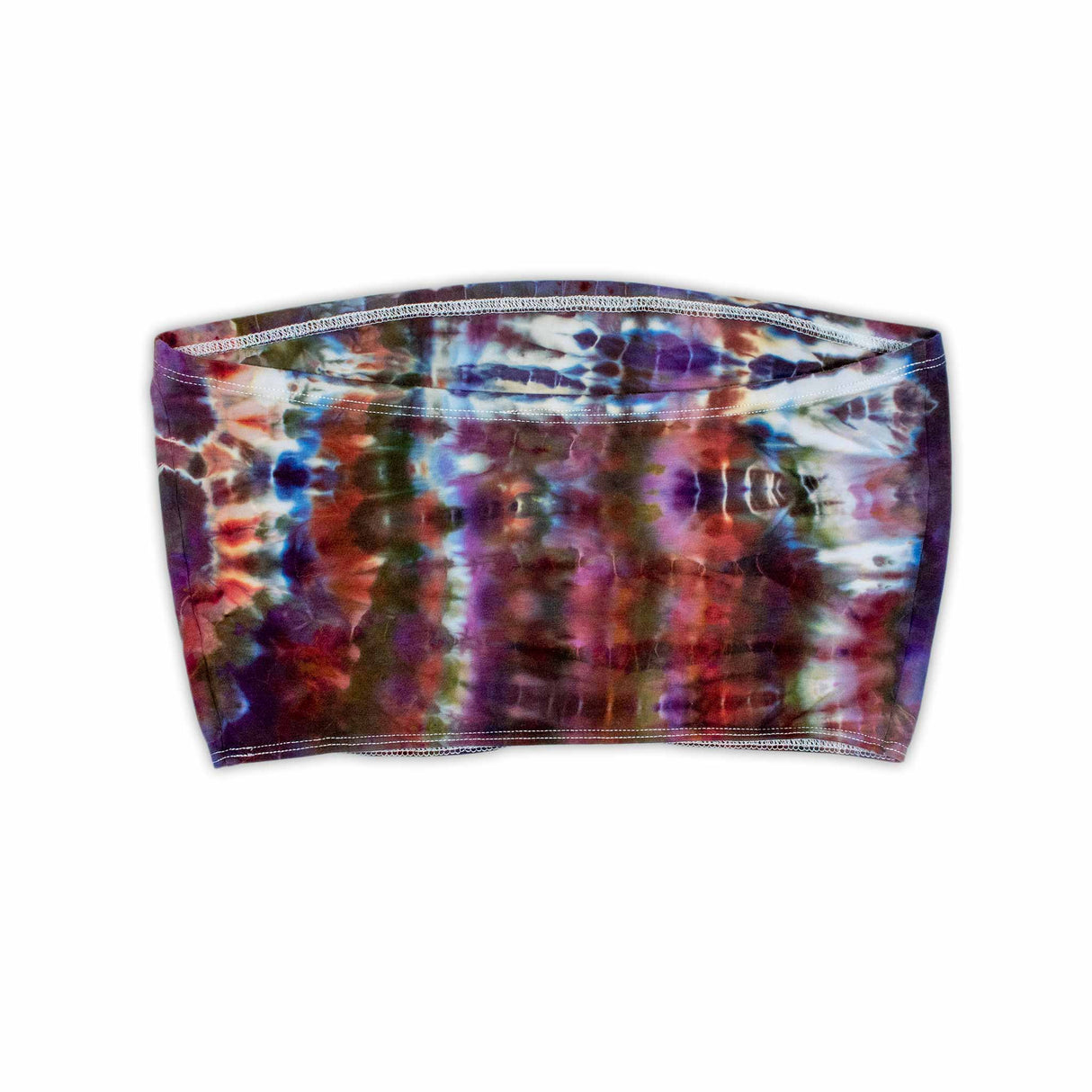 An ice-dyed bandeau top displaying an electric blend of cobalt blue, magenta, and plum, mimicking the natural marbling of semi-precious stones.