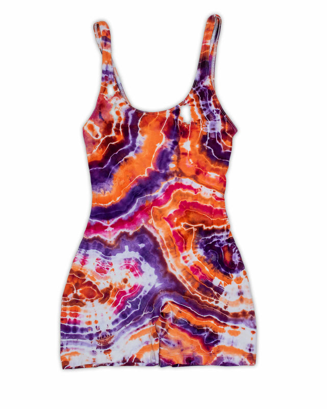 An electric ice-dyed jumpsuit with psychedelic patterns that dance across the fabric in hues of electric violet, burnt orange, and deep purple..