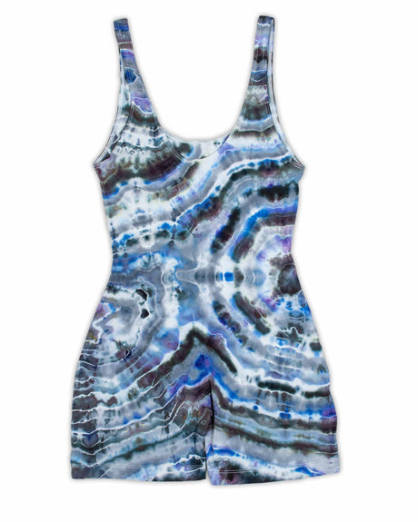 This form-fitting jumpsuit showcases a unique ice dye technique, evoking the beauty of geodes with layers of ultramarine, violet, and ash.