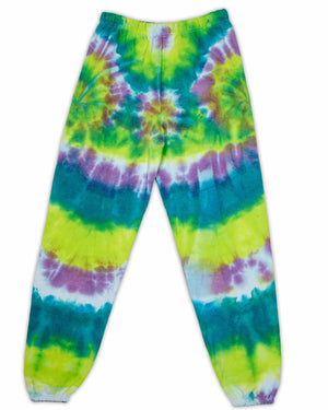 A pair of tie-dye sweatpants, with a bold, psychedelic swirl in electric lime, azure, and plum colors, perfect for a relaxed yet stylish look.