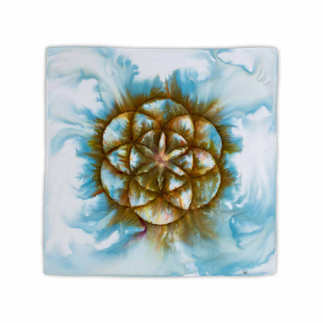 A hand-dyed bandana capturing the sacred geometry of the Seed of Life, ice-dyed in a blend of forest greens and browns, floating on a misty blue background.